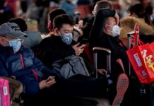 Hạn chế tối đa đưa du khách Việt tới vùng có dịch viêm phổi Vũ Hán Trung Quốc có thể kéo dài kỳ nghỉ Tết để chống viêm phổi Vũ Hán lây lan /// Ảnh AFP