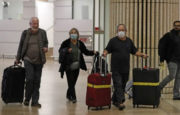 Bộ Y tế yêu cầu công dân nước mình - những người trở về nhà từ Trung Quốc đại lục, Hong Kong, Macau, Singapore, Thái Lan, Hàn Quốc và Nhật Bản - tự cách ly trong 14 ngày. Ảnh: AFP.