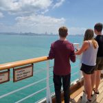 20 khách tàu MS Westerdam nghi nhiễm nCoV Hành khách trên tàu MS Westerdam nhìn về phía thị trấn cảng Sihanoukville của Campuchia, nơi tàu được cấp phép cập cảng vào 13/2. Ảnh: Angela Jones/Reuters.