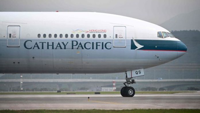 Cathay Pacific là hãng bay nổi tiếng của Hong Kong còn ICO là cơ quan độc lập giám sát việc đảm bảo quyền tự do thông tin vì lợi ích cộng đồng. Ảnh: AFP.