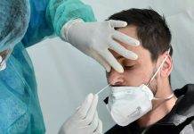 COVID-19: Những triệu chứng đáng chú ý cả khi đã xét nghiệm âm tính COVID-19: Những triệu chứng đáng chú ý cả khi đã xét nghiệm âm tính - Ảnh 1.